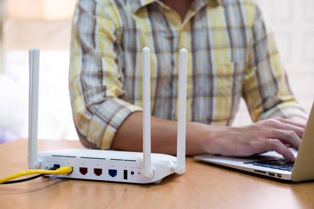 Technician Testing Wifi Router